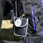 Galaxy taske med reflekskanter og refleksvedhæng fastgjort på rygsæk til outdoor og vandretur