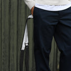 person wearing a reflective strap for everyday use