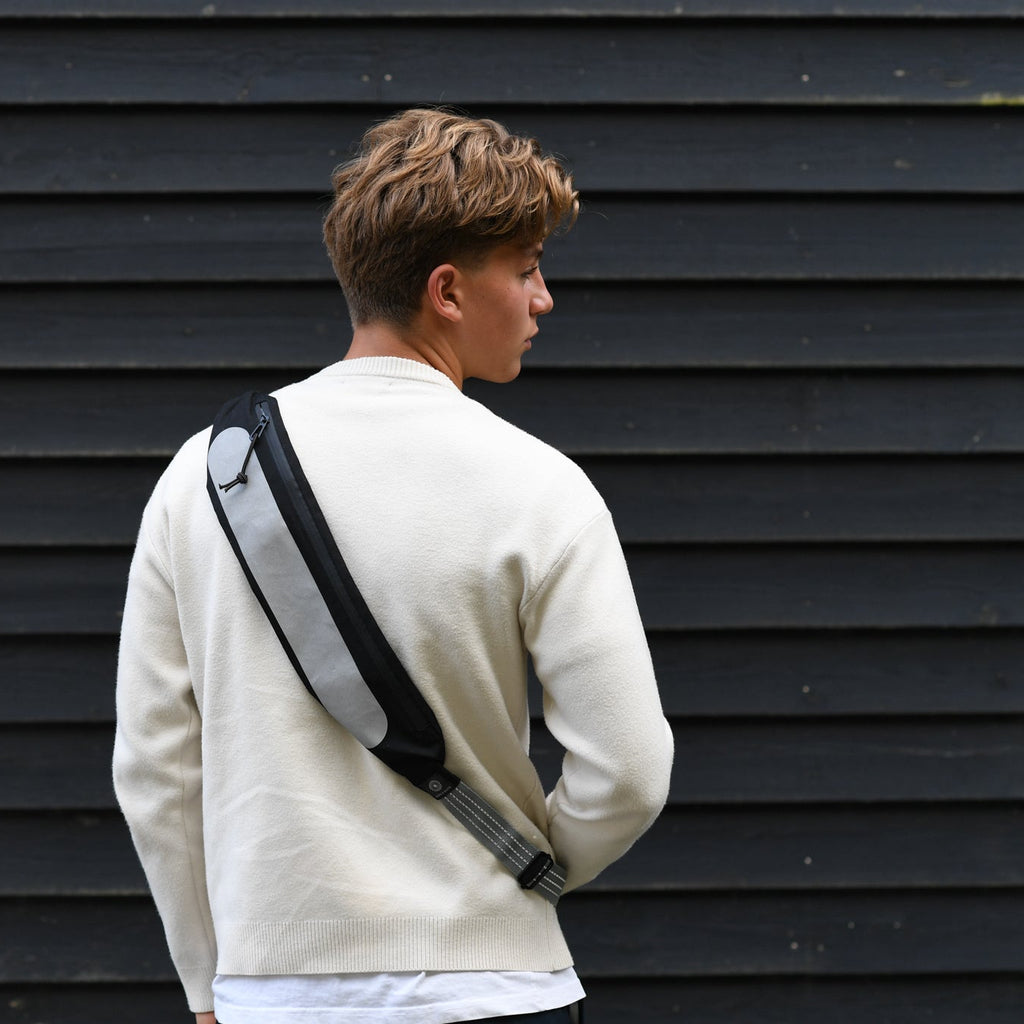 refleks taske strap der øger synlighed i trafikken i hverdagen