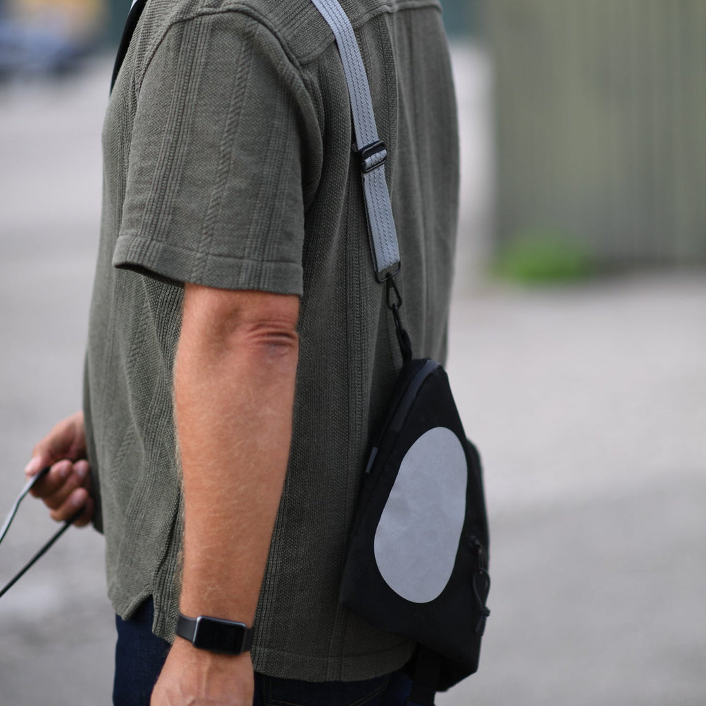 refleks taske strap der øger synlighed i trafikken i hverdagen