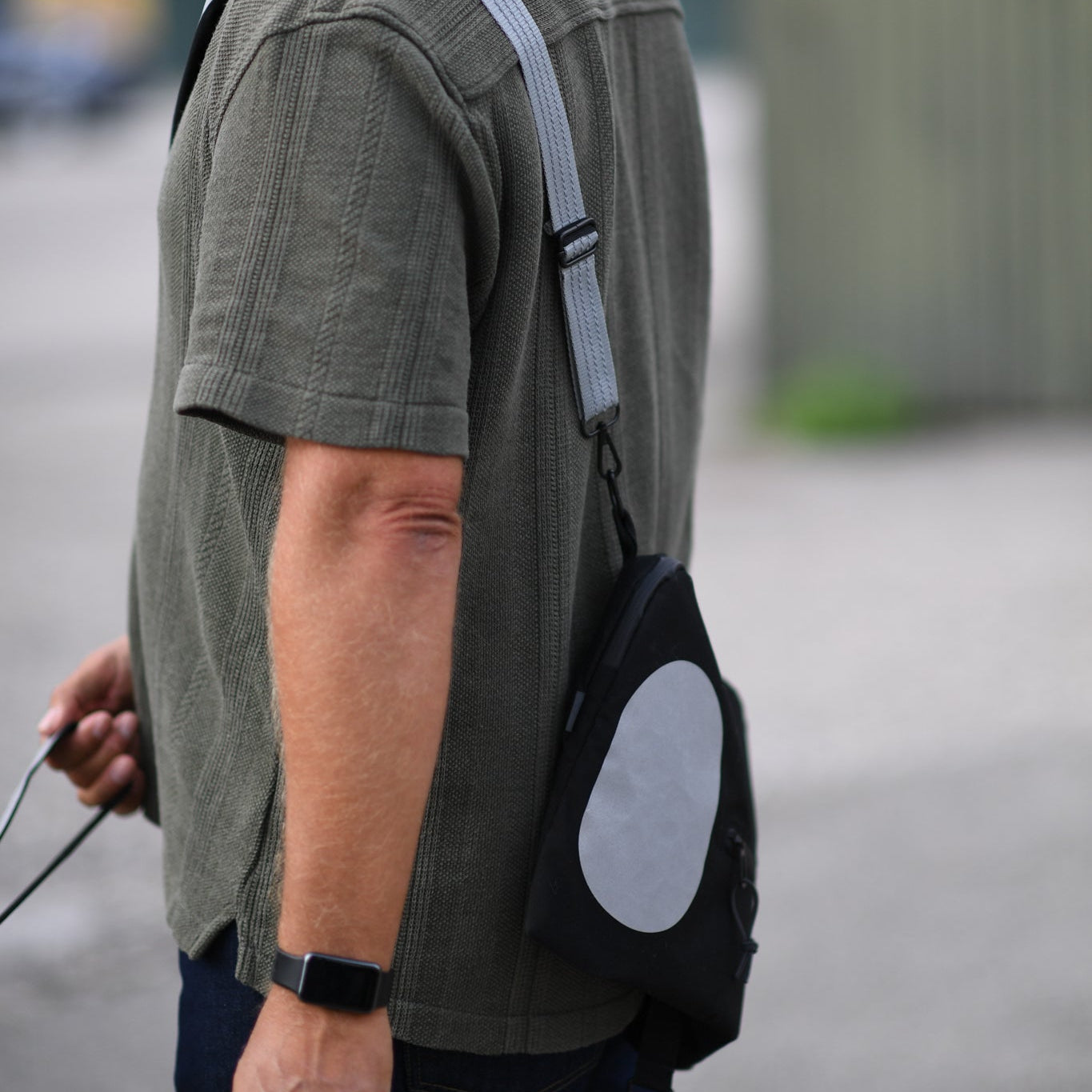 refleks taske strap der øger synlighed i trafikken i hverdagen