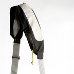 2-i-1 taske med refleks strap der kan bruges som crossbody og øger synlighed i trafikken