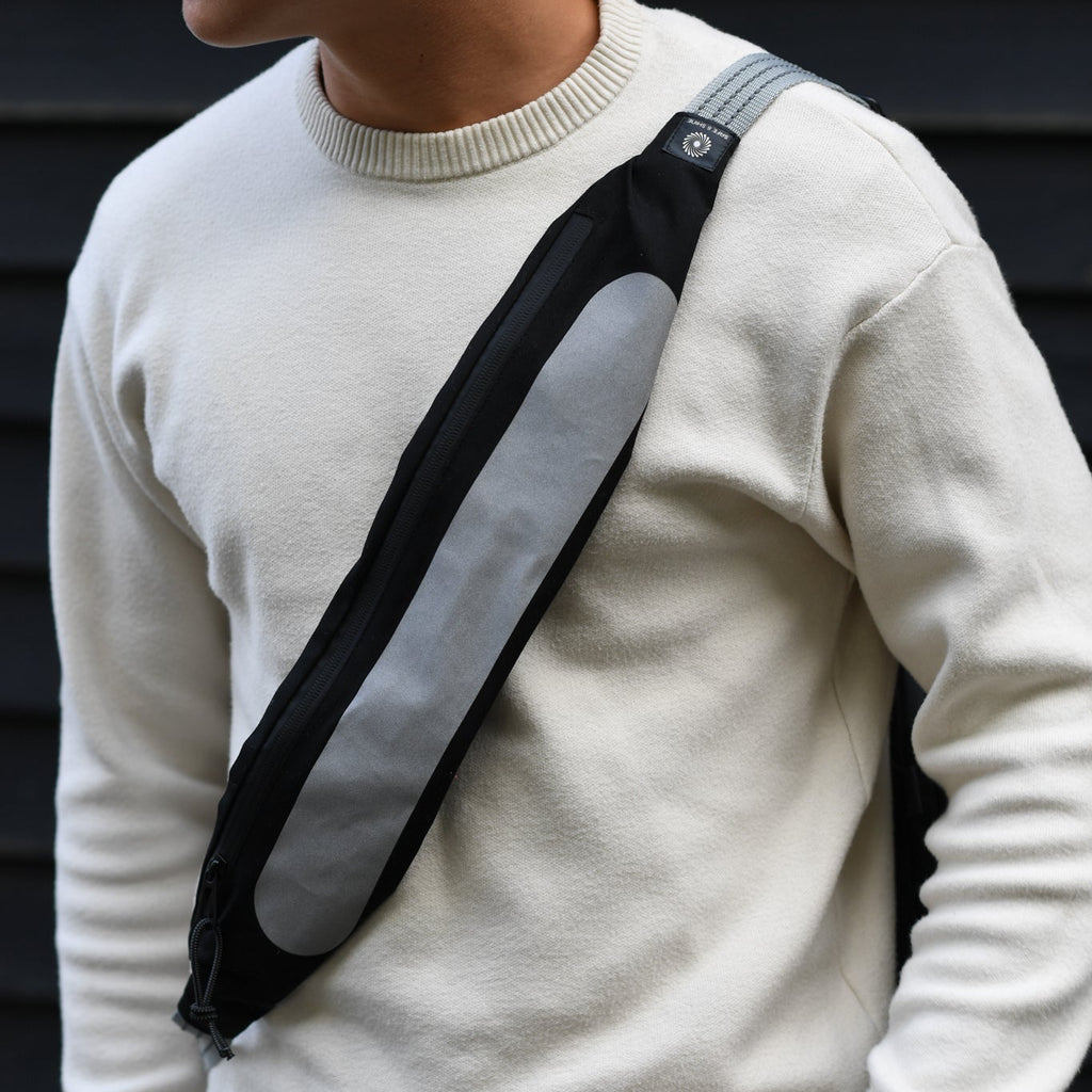 refleks taske strap der øger synlighed i trafikken i hverdagen